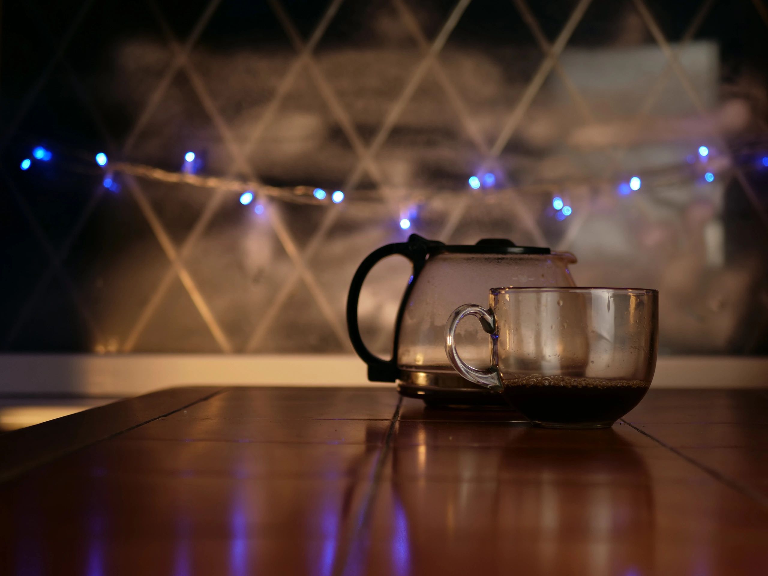 Coffee mug on a table, ready to stay warm
